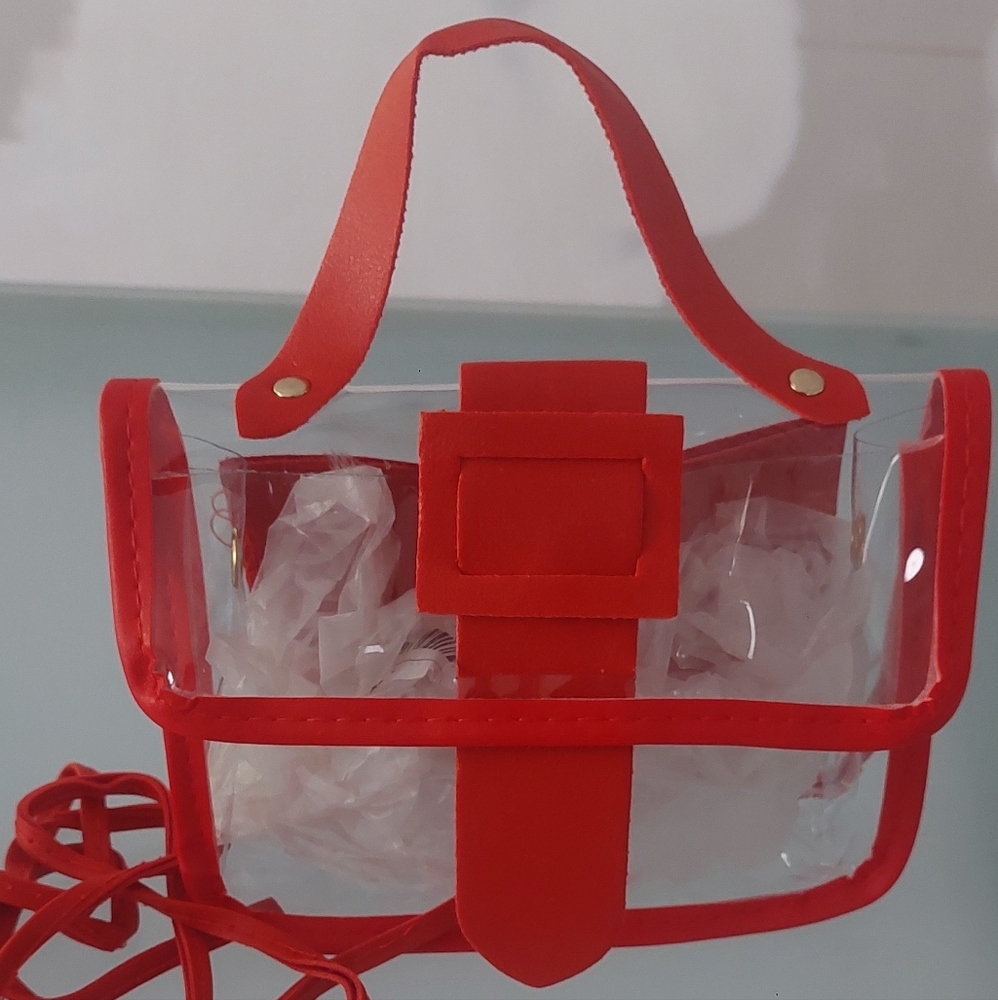 Beautiful  small clear purse hand bag or a shoulder purse.